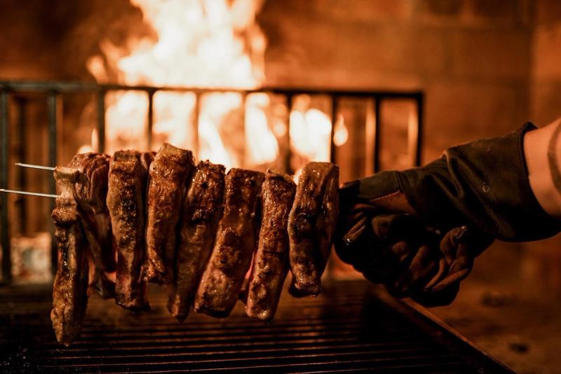 Sosatie cooked over the fire