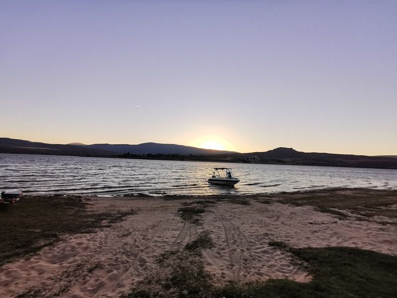 Sunset cruise activity over the Clanwilliam Dam with Cederberg Ridge Wilderness Lodge