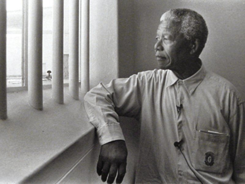 Nelson Mandela in his cell on Robben Island