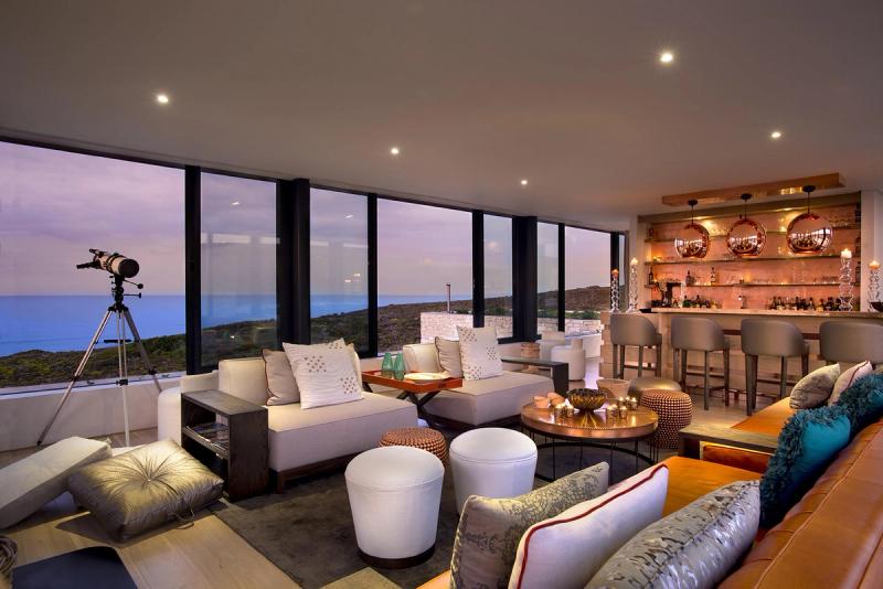 living area with bar and ocean views