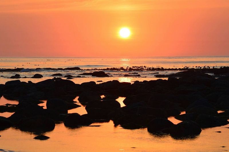 Un des plus beaux couchers de soleil du Cap sur la plage de Kommetjie