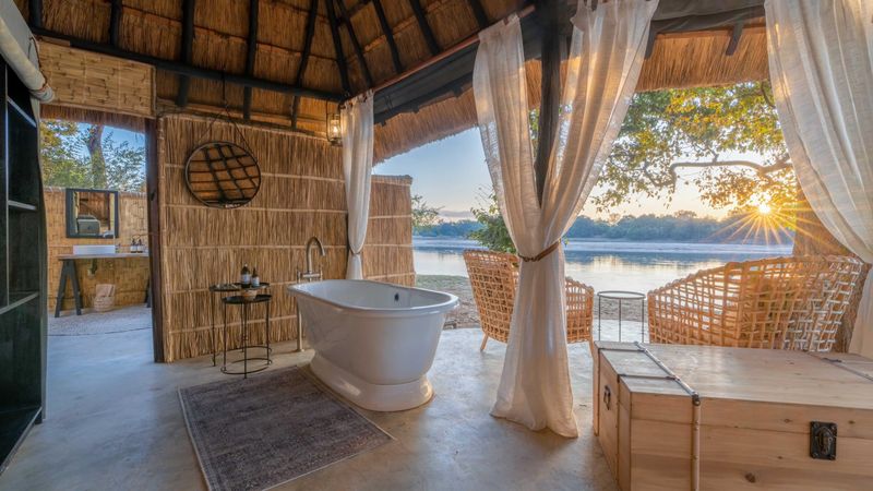 Bath with a view at Time + Tide Mchenja Camp