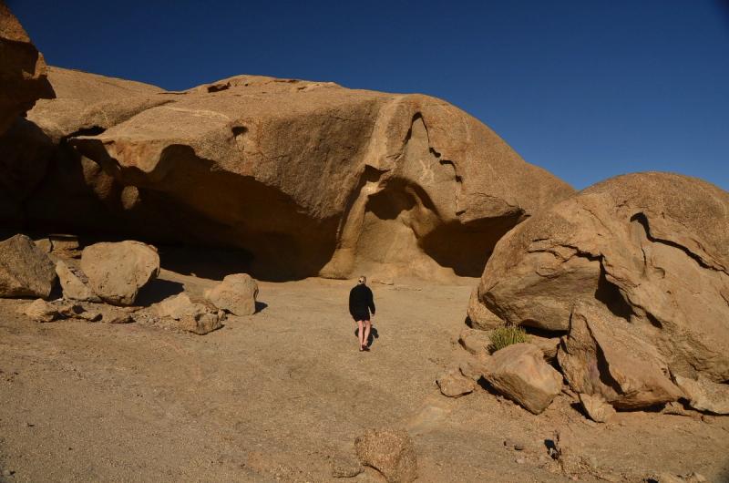Patti looking for a place to camp among the rocks