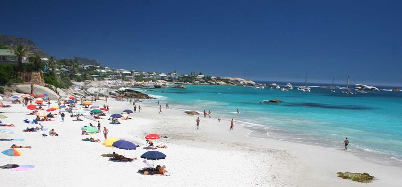 Beachgoers enjoying the sun on Clifton 1st Beach