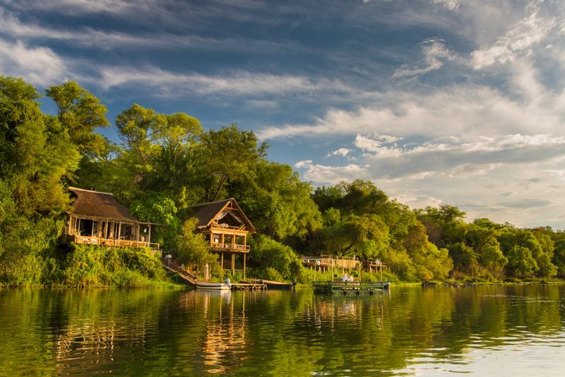 View of Tongabezi Lodge across the river