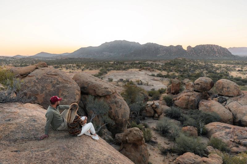 Couple looking out at the view in Namibia