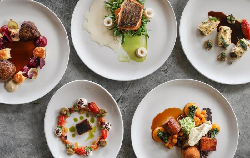 Five beautifully styled and colourful plates at Idiom restaurant in Somerset West