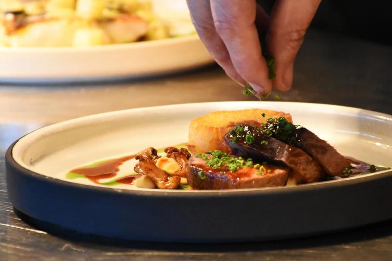 Plated gourmet meat dish at the Jordan Restaurant