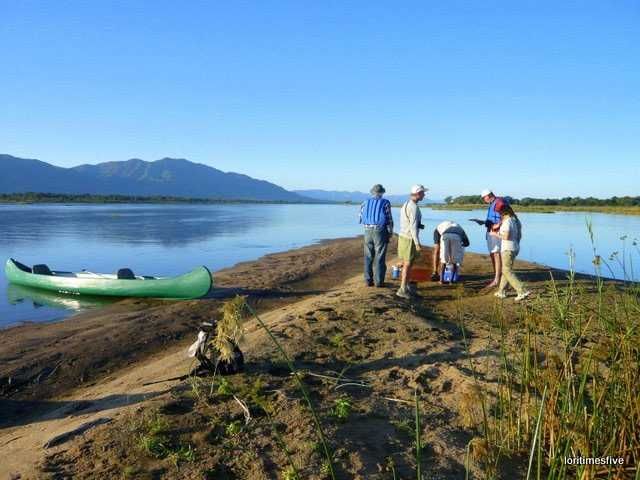 "We all climbed out of our boats to this temporary little sandbar and had Gin & Tonic's, wine and beer and toasted our good fortune and amazing adventure." | The Zambezi River