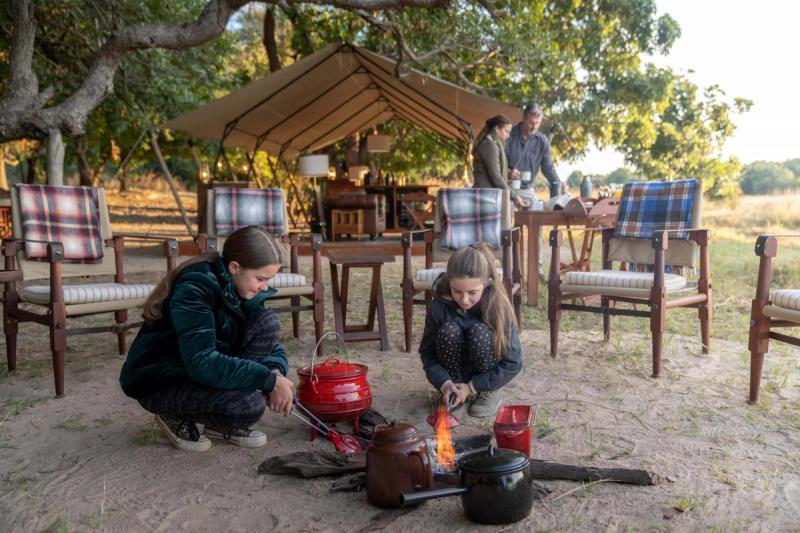 Family bonding in the bush at Time + Tide Luwi Bush Camp