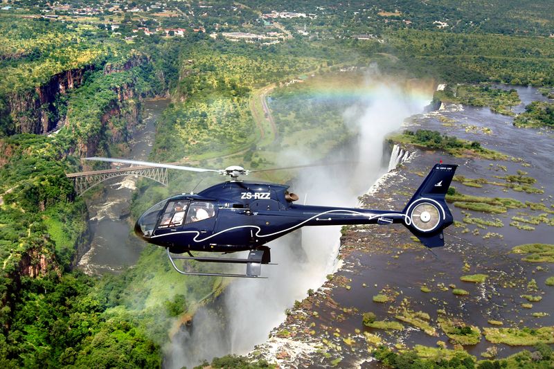 Helicopter flying over Victoria Falls