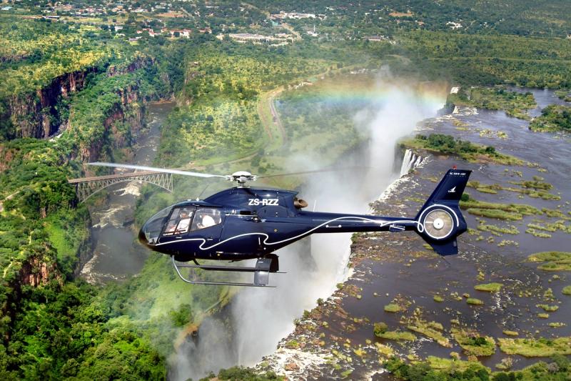Helicopter flying over Victoria Falls