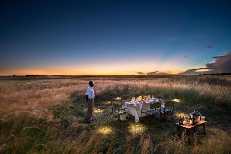 Bush dinner in Zambia at Image Credit: Time + Tide King Lewanika Lodge wildebeest
