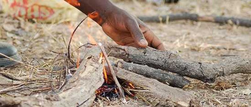 Making fire for camp