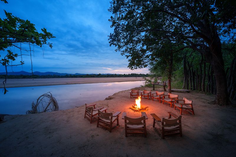 Boma fire at night at Bilimungwe Bushcamp