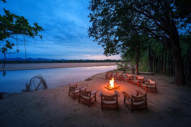 Boma fire at night at Bilimungwe Bushcamp