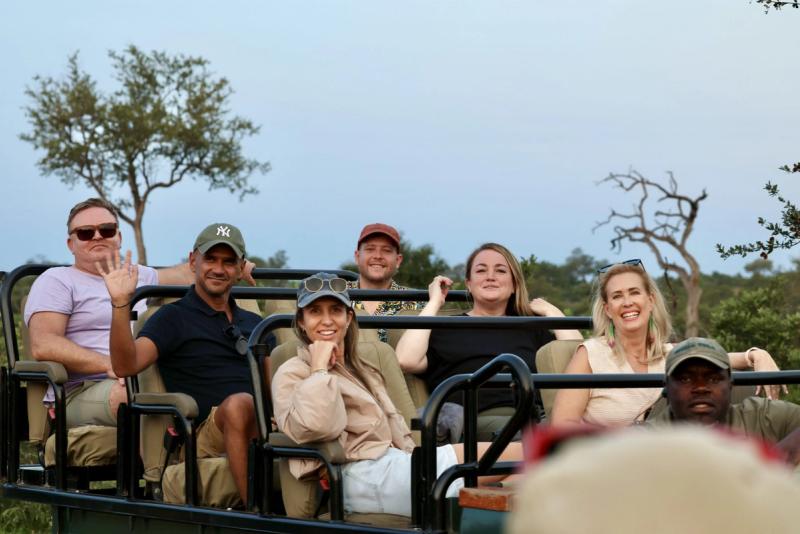 Rhino Africa Travel Experts on a game drive vehicle on safari with Tanda Tula