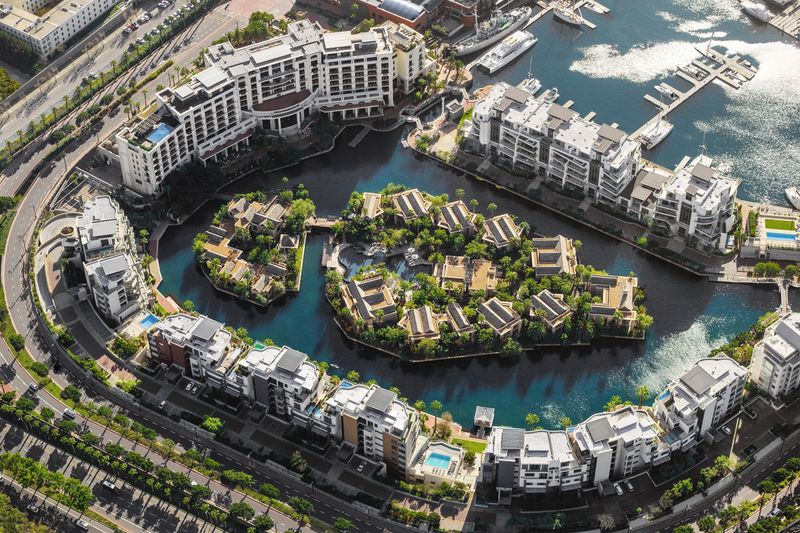 An aerial view of the One&Only Cape Town’s private island and marina, a standout among luxury hotels in Cape Town