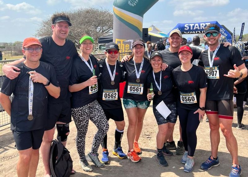 Standing at the finish line with medals around our necks