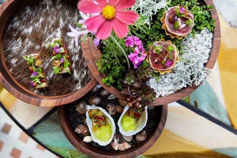 Three-tiered fine dining dish by La Petite Columbe in Franschhoek