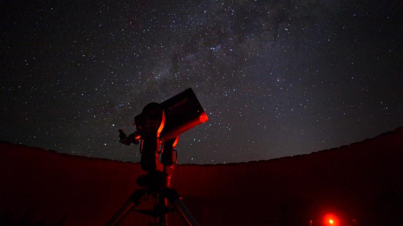 Stargazing with a telescope in Sossusvlei
