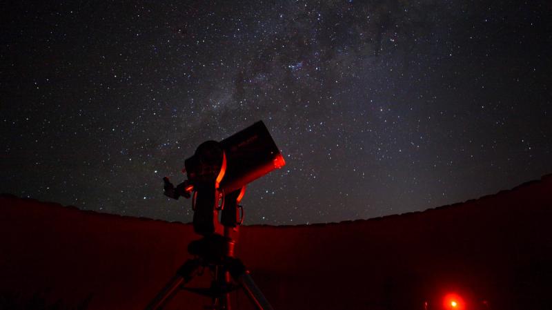 Stargazing with a telescope in Sossusvlei