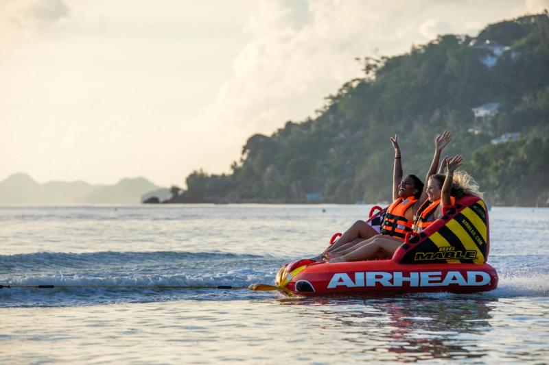 Two young girls out on the water in the Seychelles