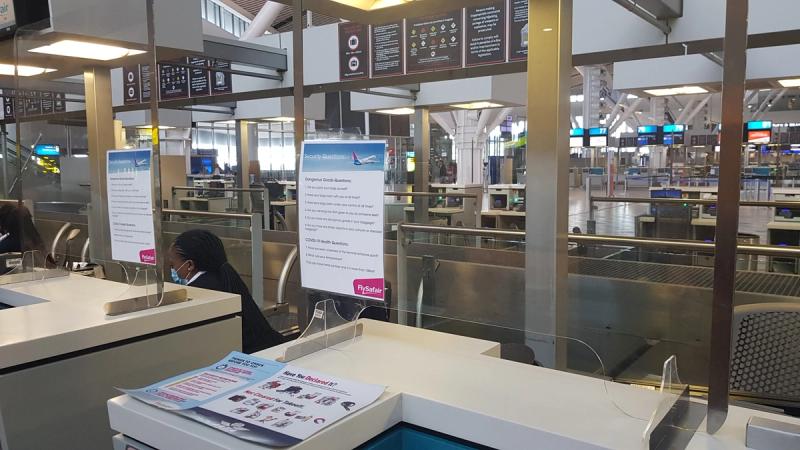 Flug in Covid-19-Zeiten - Sicherheitsmaßnahmen am Flughafen in Kapstadt