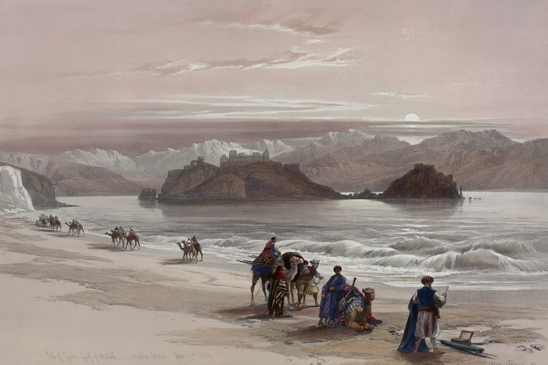 Caravana de viajeros en camellos