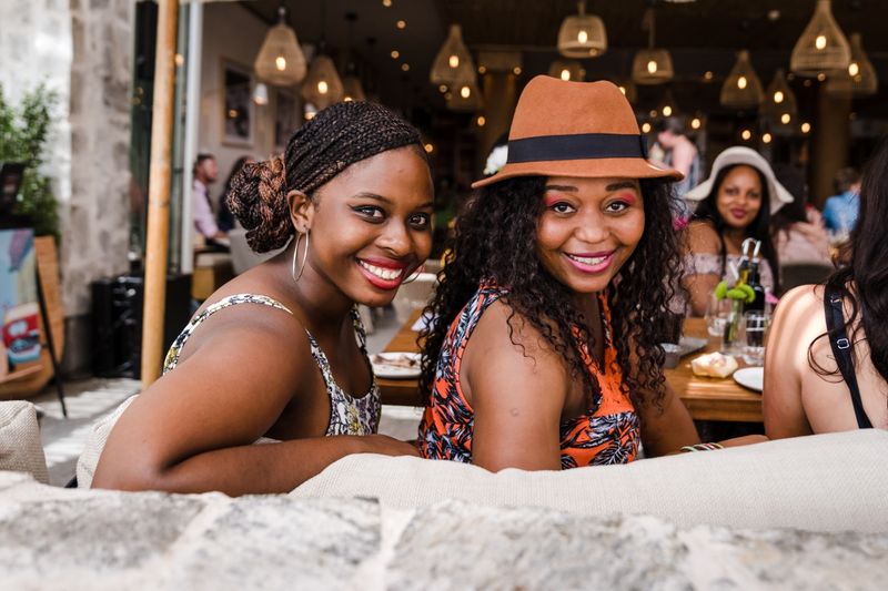 Two of the Rhino Crash members sitting on a couch at a function
