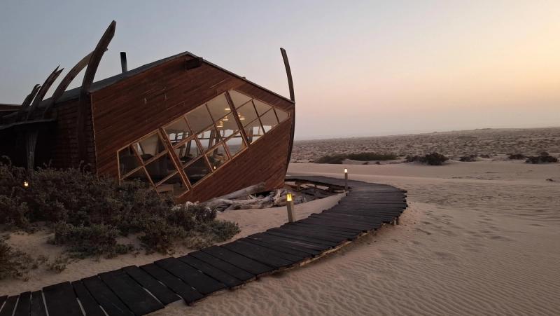 A wooden cabin overlooking Skeleton Coast, one of the top luxury lodges in Nambia