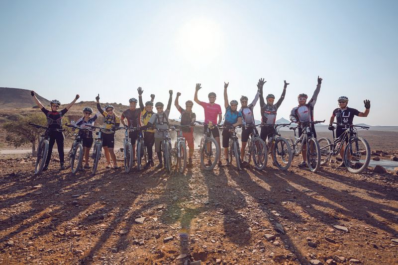 A group of Challenge4ACause 2019 riders take a picture