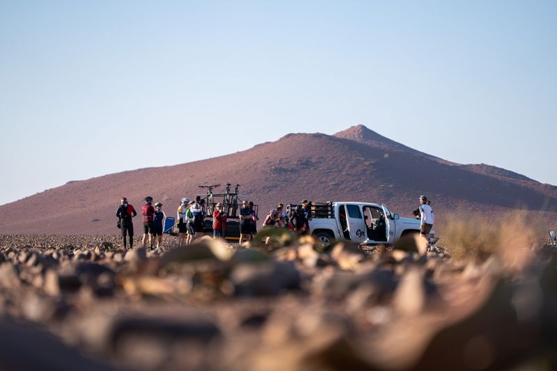 Support vehicle and riders during a water stop