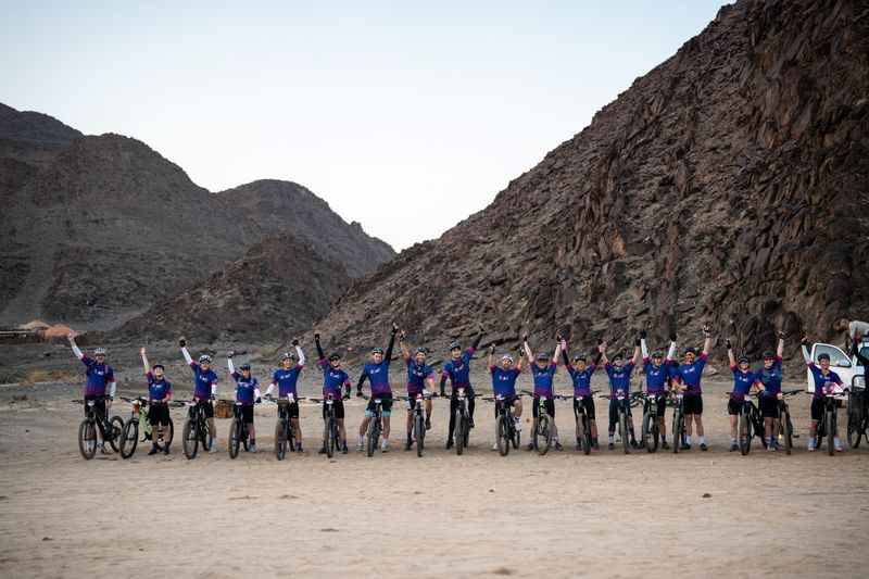 Riders lined up for a photo before departure