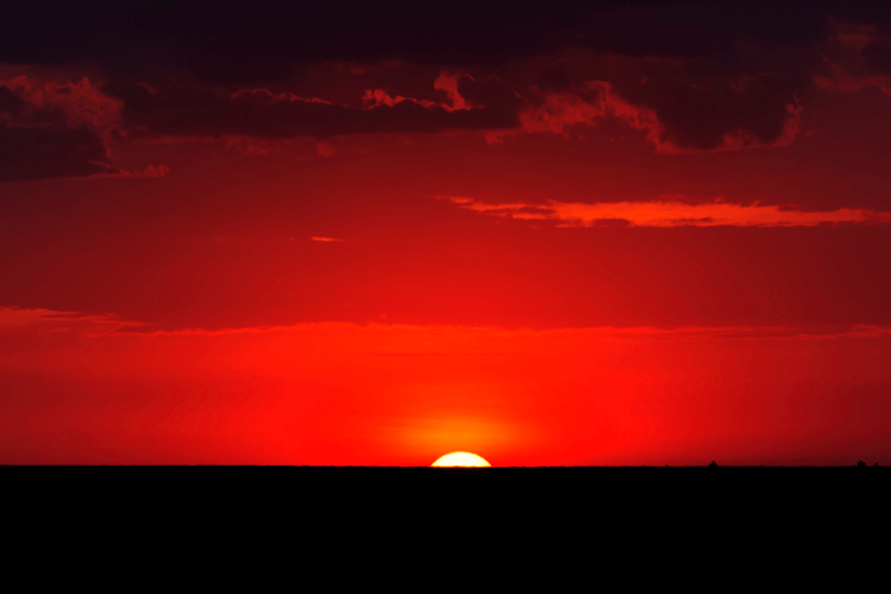 Pôr-do-sol por Clement Kigaru