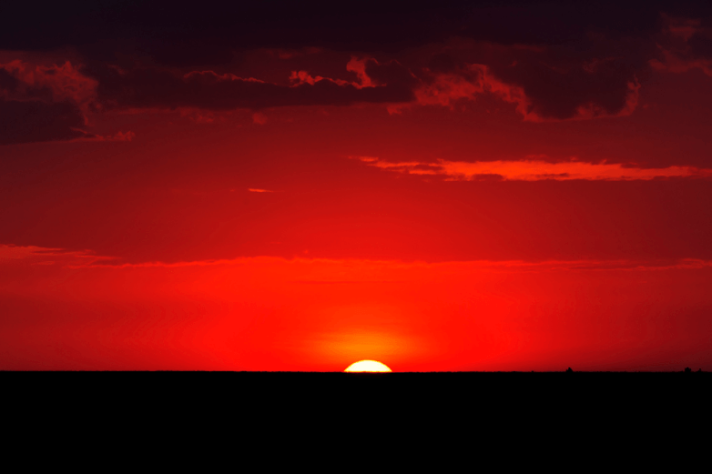 Pôr-do-sol por Clement Kigaru