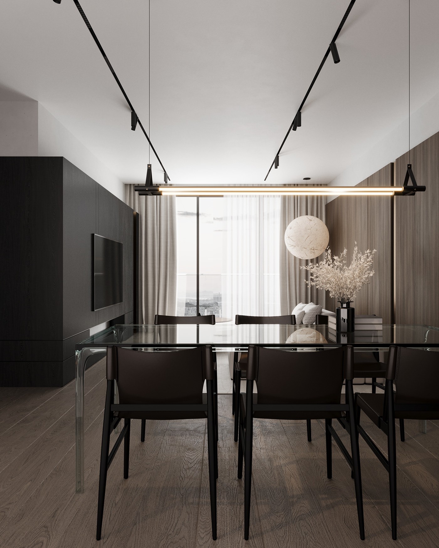 Dining area with glass table and black chairs, apartment in Skopje