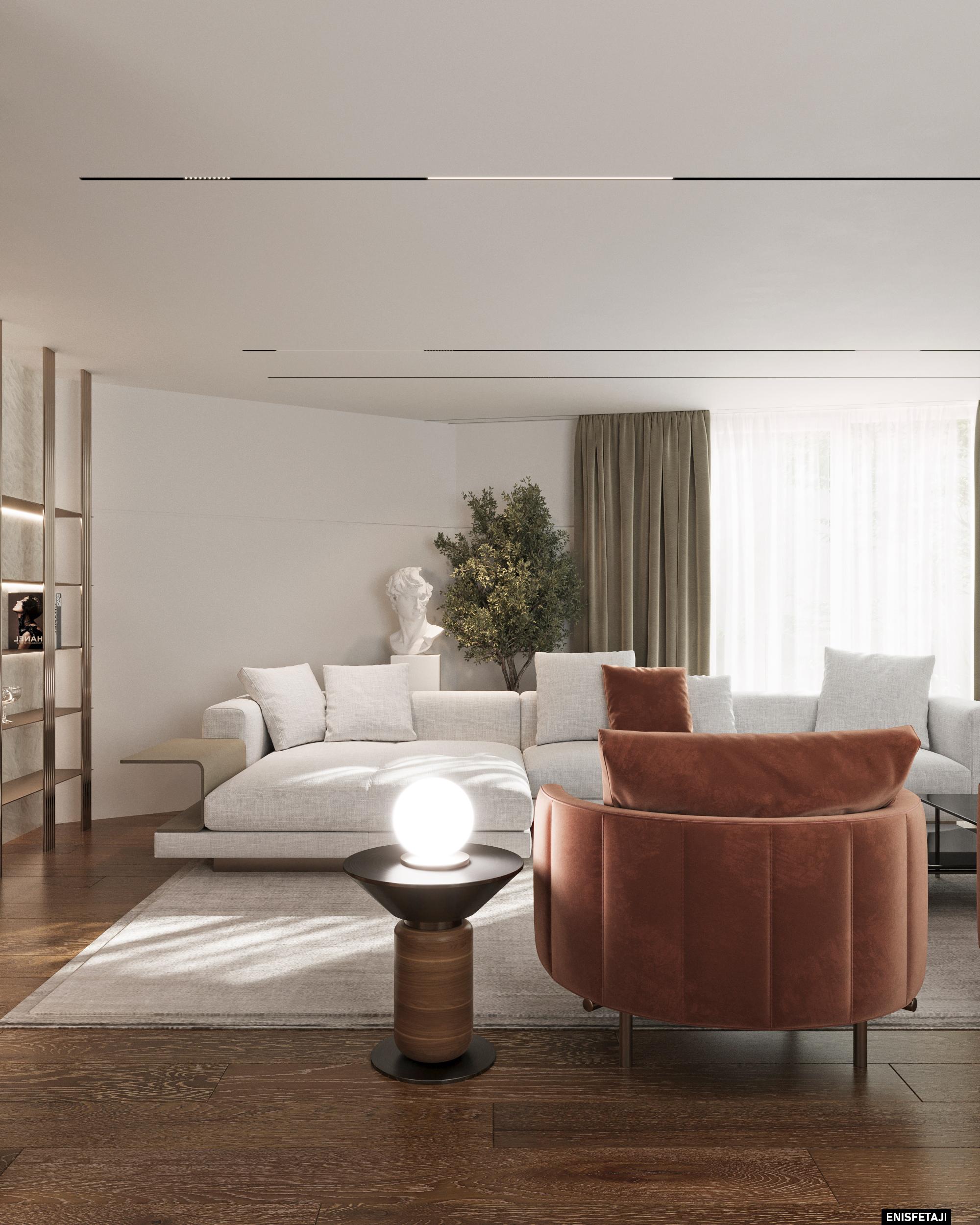 Bright living room with white sofa and terracotta velvet armchair, residence in Goldach, Switzerland