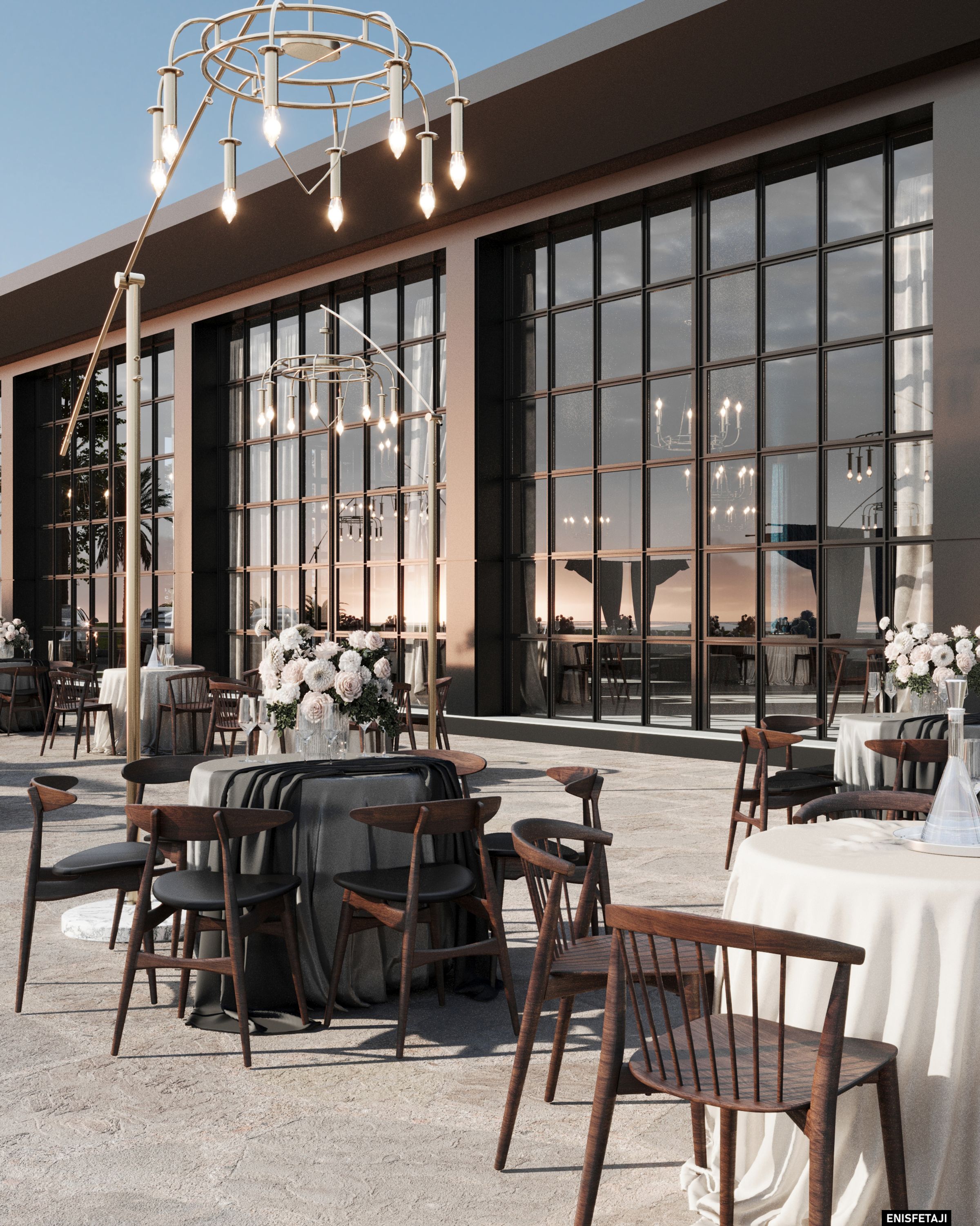 Terrace dining tables with a chandelier in front of large windows, restaurant in Struga