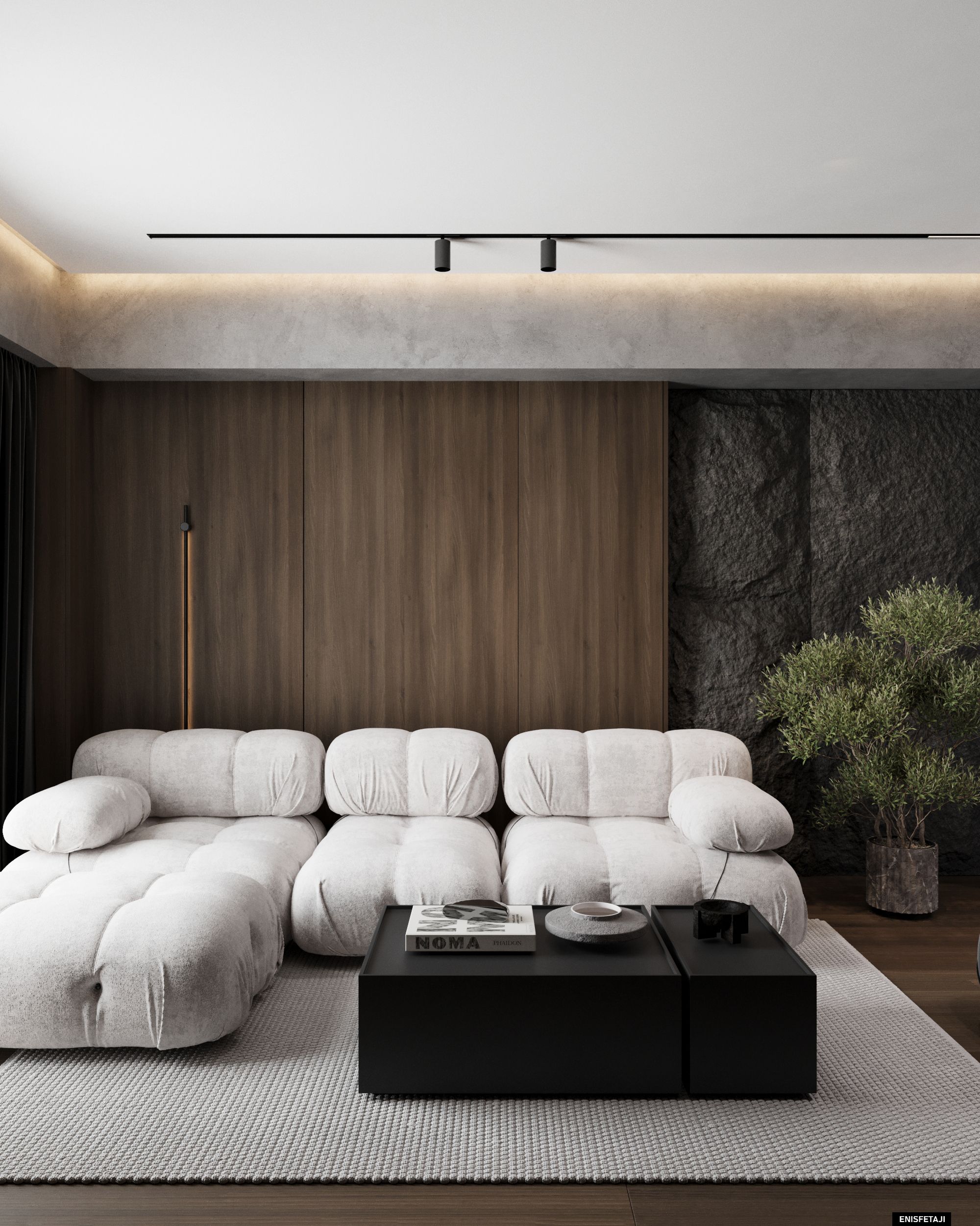 White modular sofa with black coffee table and stone wall, apartment SK65 in Skopje