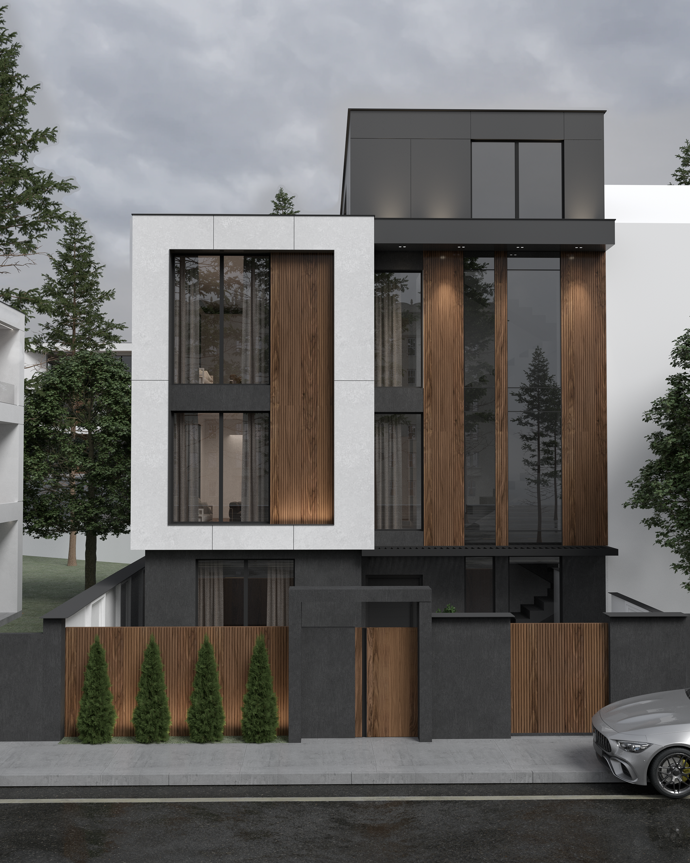 Front facade of a three-story house with wood slats and lighting, Gostivar