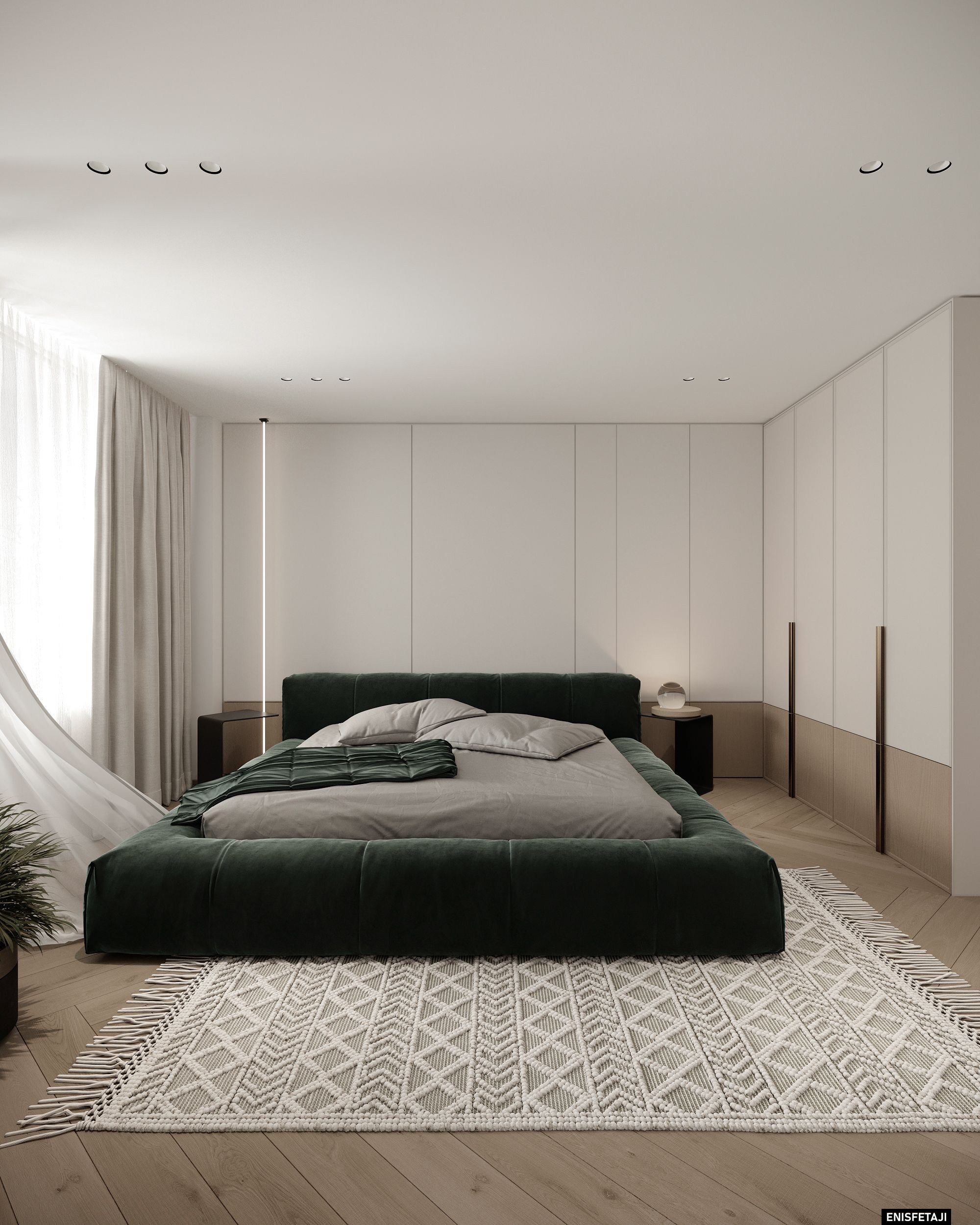 Guest bedroom with dark green velvet bed and patterned rug, apartment GV22 in Gostivar