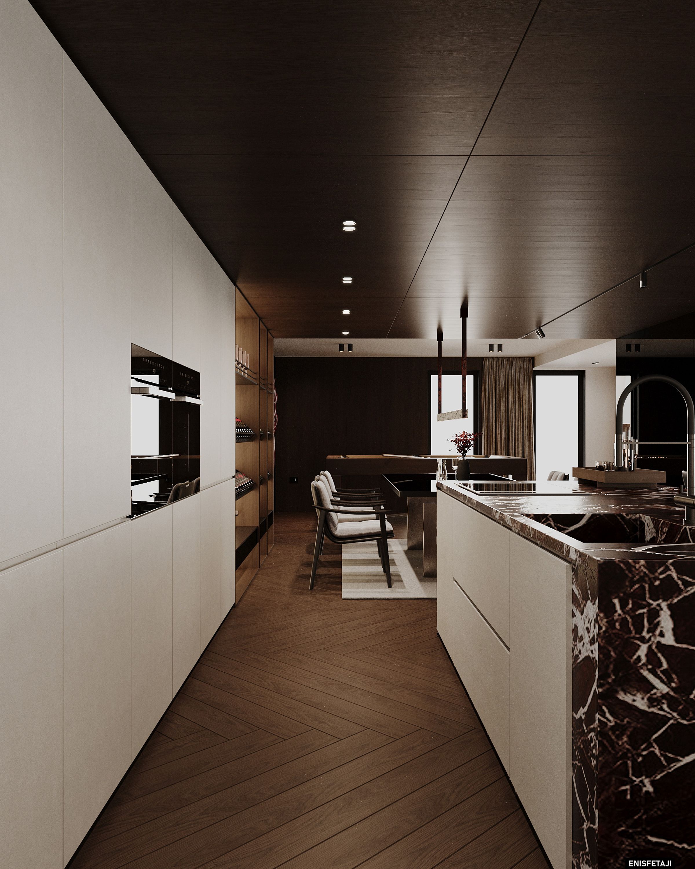 Kitchen with red marble island and built-in ovens, residence in Prilep