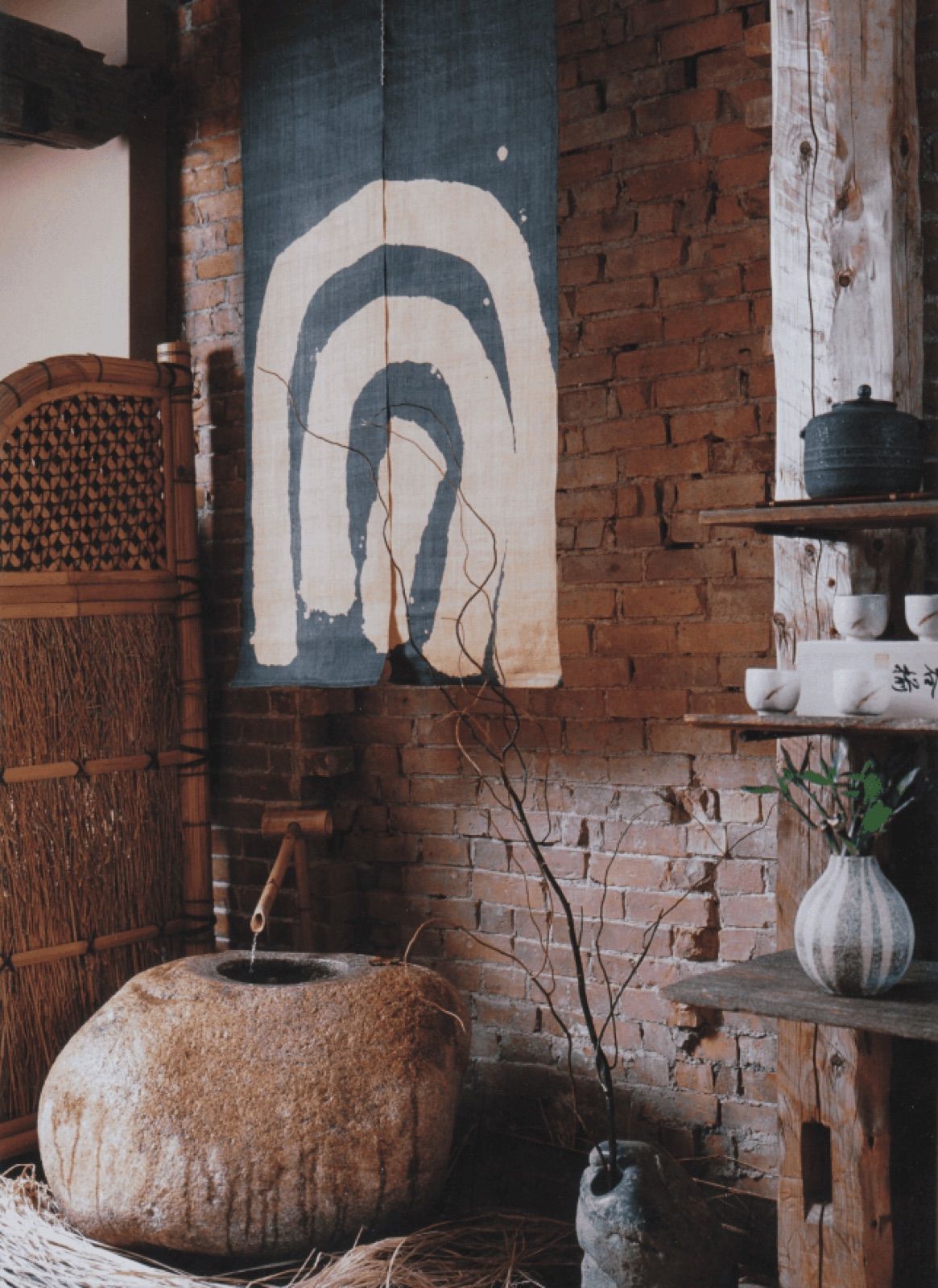 Tokai Japanese gift store retail display with noren and stone basin, Boston