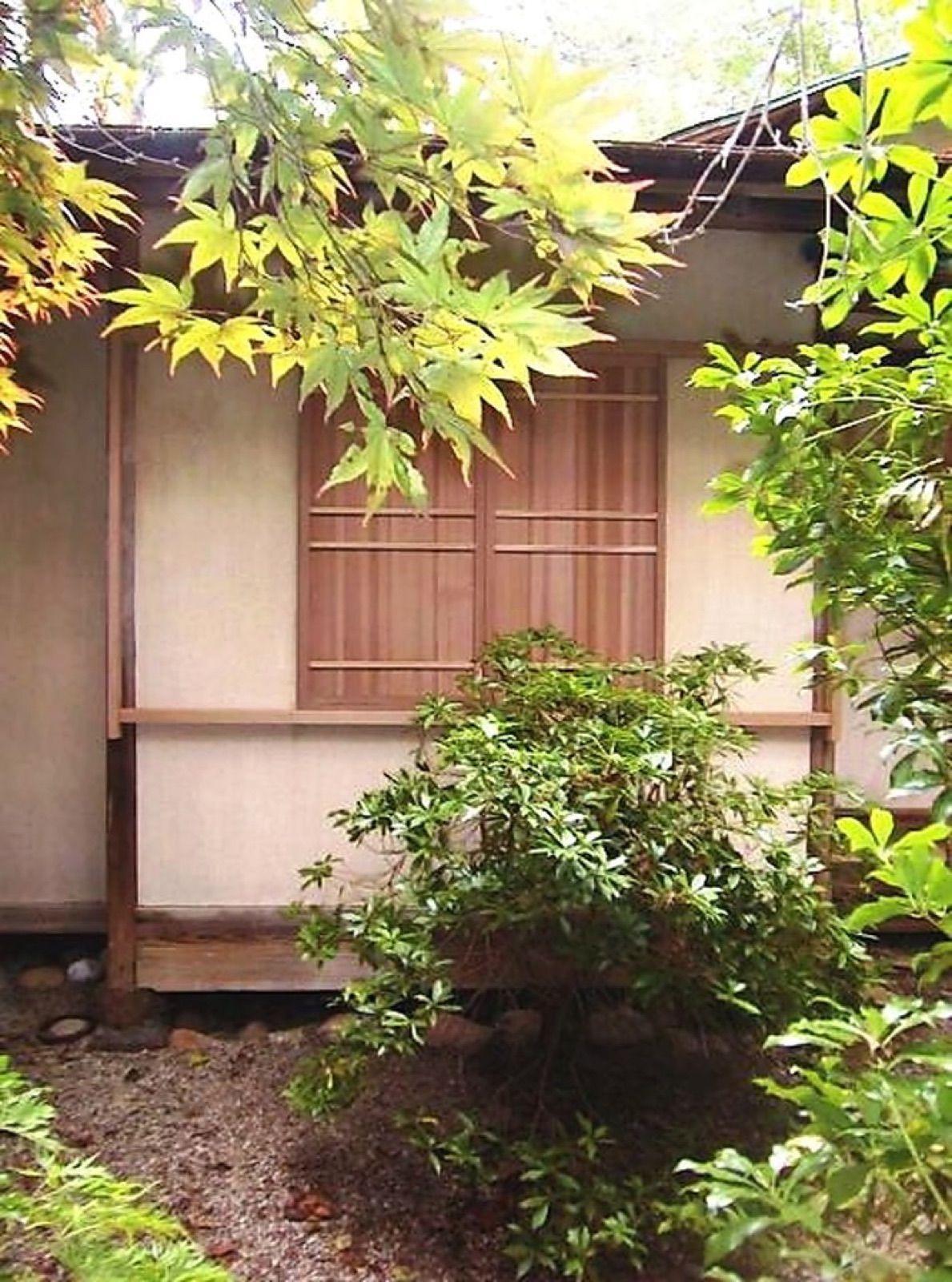 Restored tea house window with wooden shutters