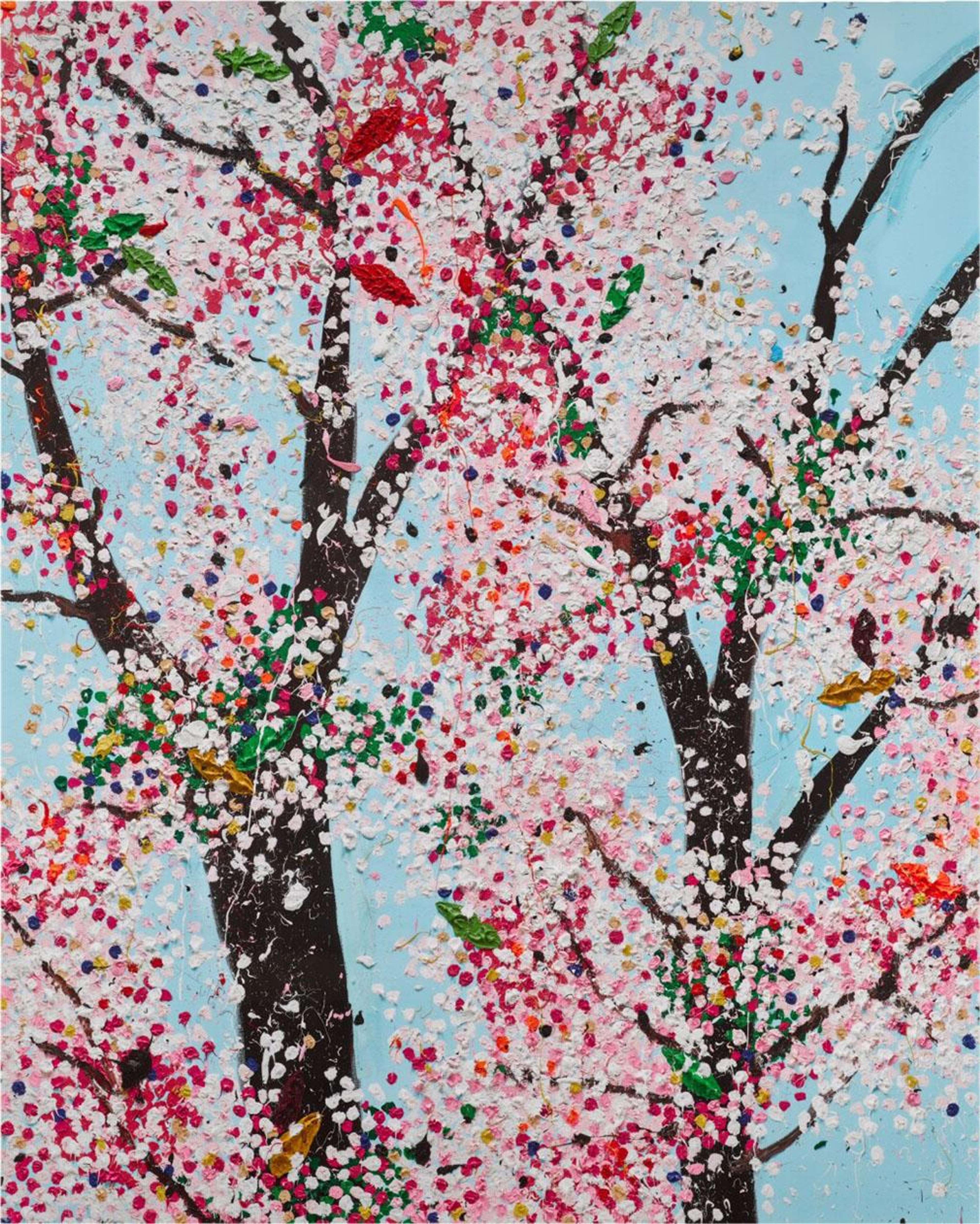 Blossom tree branches painted on a blue background