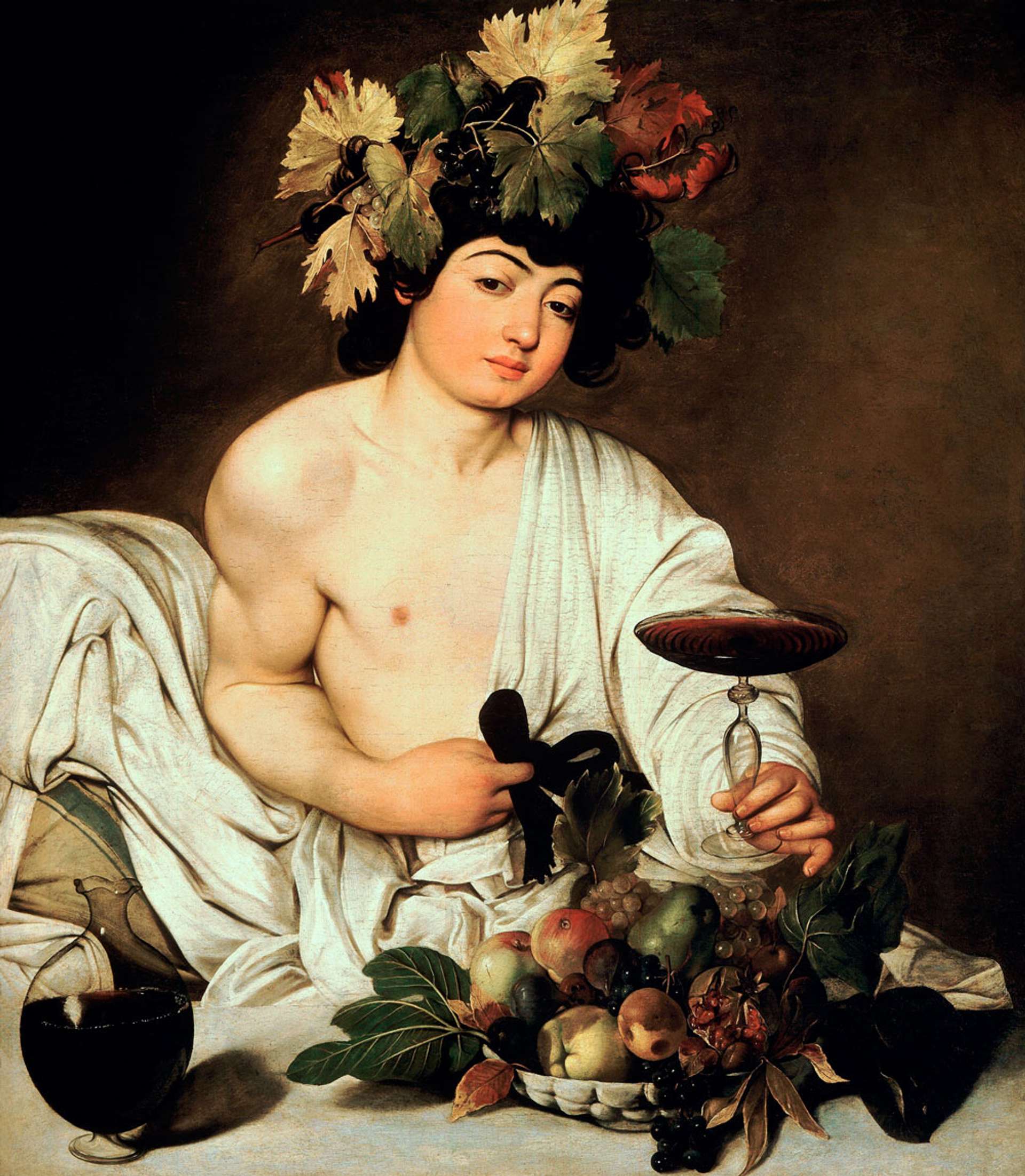 A man half draped in cloth wearing a flora headpiece surrounded by fruit and holding a glass of wine towards the viewer