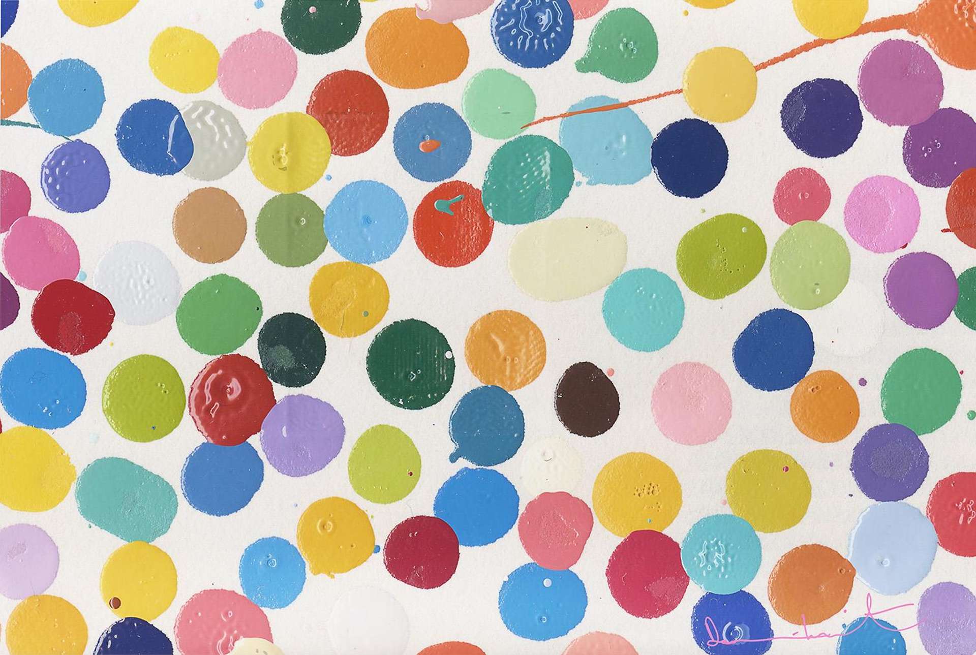 Close up of multicoloured dots covering a sheet