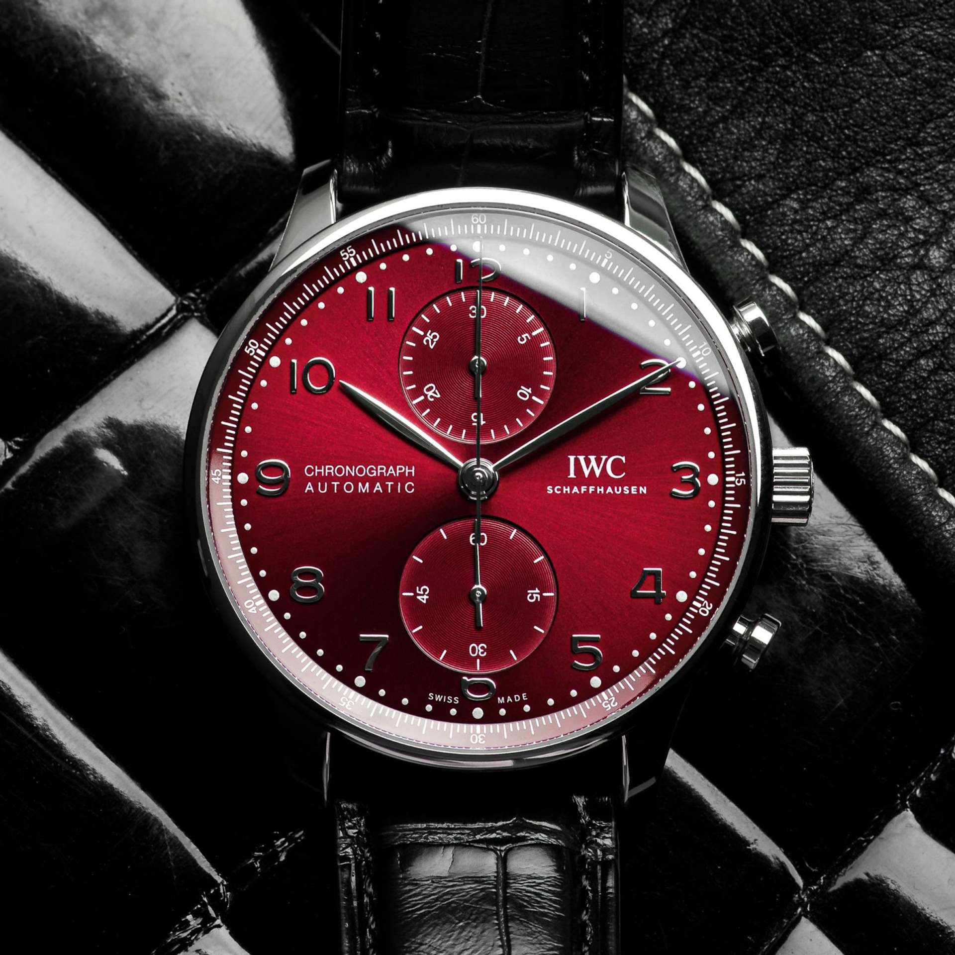 An IWC Portugieser Chronograph with a burgundy dial, first launched in 1939.