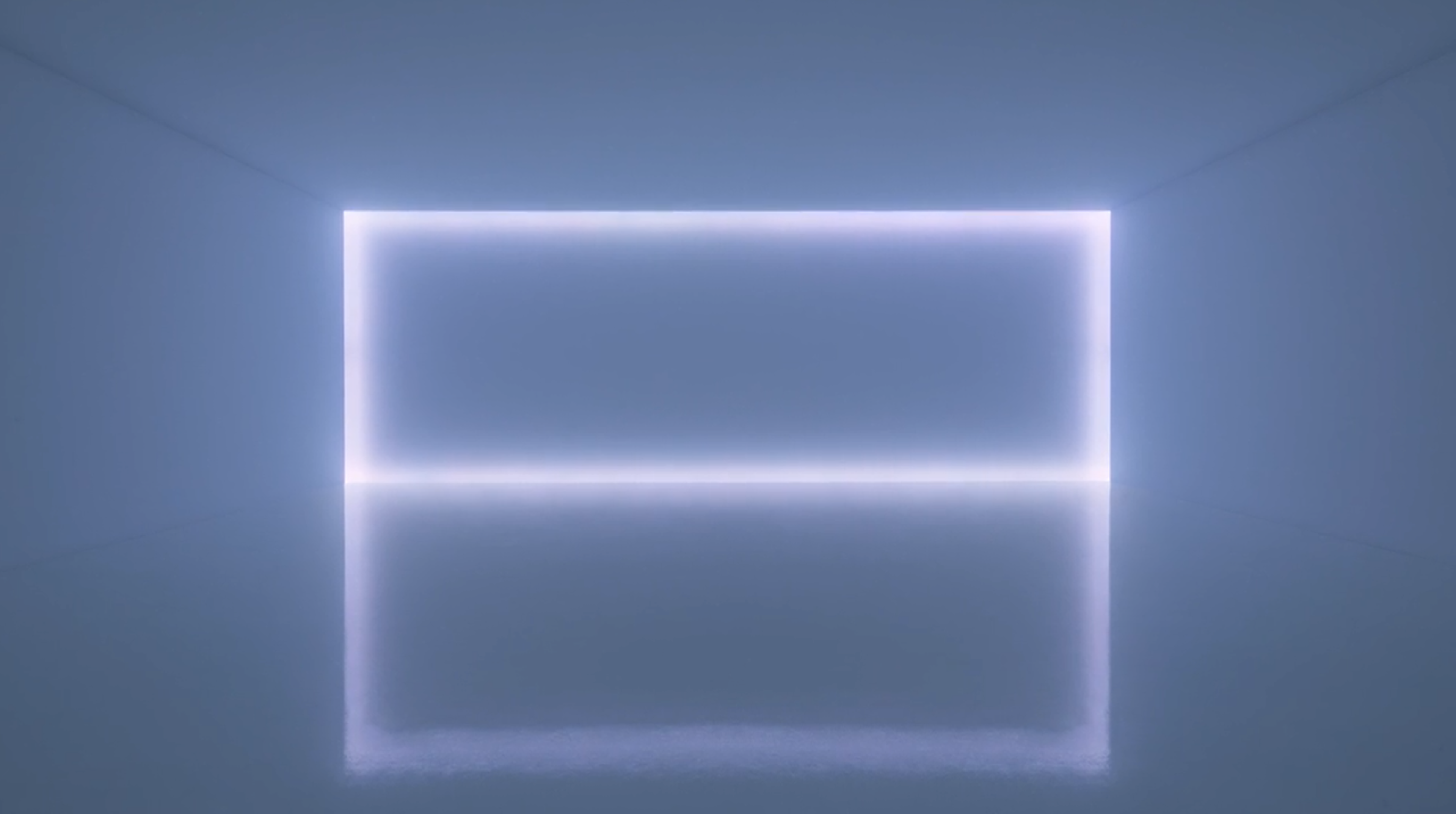 This screenshot shows an immersive work by Doug Wheeler: a thin, softly lit box at the end of a large white room.